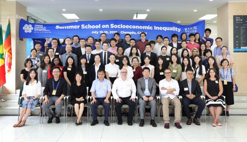 A group photo of all the students and faculty at the Summer School.
