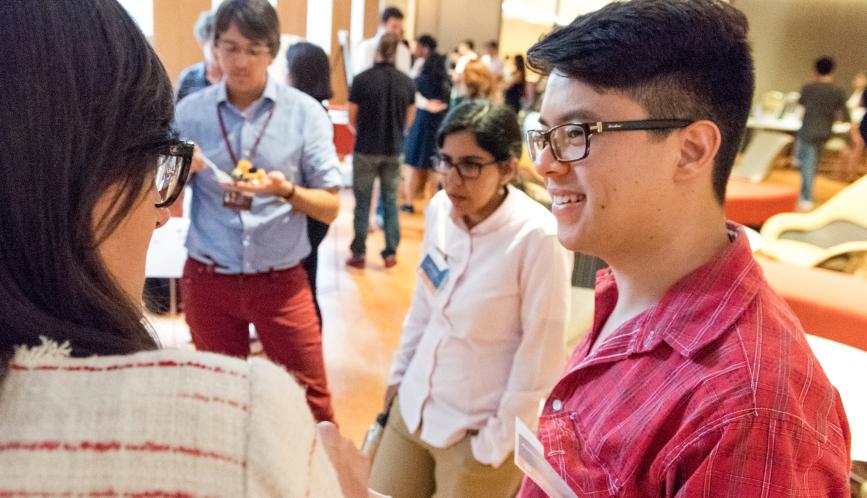 Students in conversation during a program break.