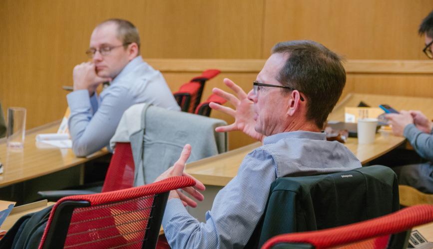 A conference attendee asking a question.