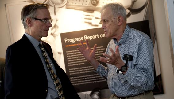 Conference attendees in conversation.